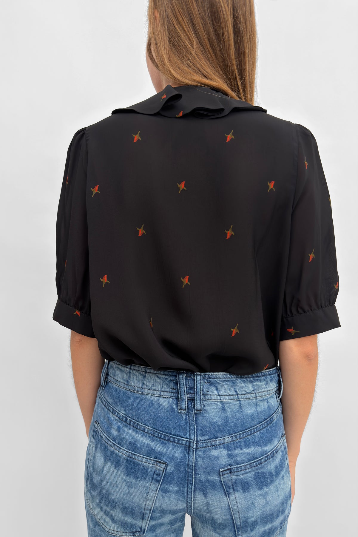 The Xilla flounce blouse