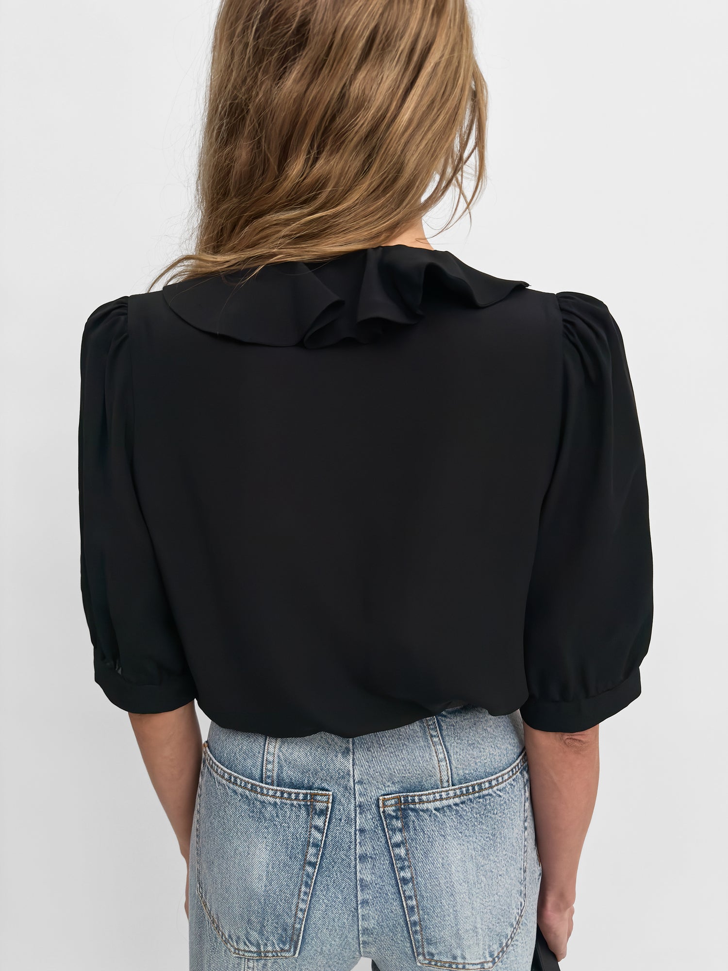 The Xilla flounce blouse
